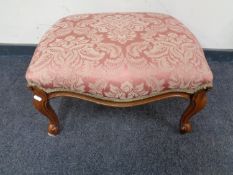 A reproduction Victorian style footstool