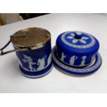 A Wedgwood Jasperware cheese dish and cover together with a biscuit barrel with plated lid and