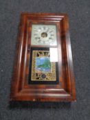 A 19th century American cased eight day wall clock by Seth Thomas