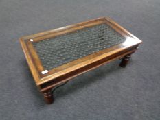 A William Sheppee Indian Collection Jali glass topped coffee table