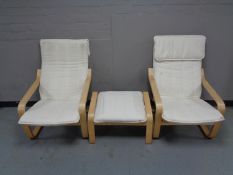 A pair of Ikea beech framed armchairs with footstool