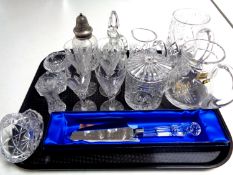 A tray of assorted glass ware, boxed Waterford Crystal cake slice, etched glass, water jug,