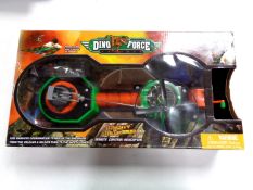 A Dino Force remote control helicopter, boxed.