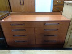 A 20th century teak G Plan double door wardrobe with matching Fresco eight drawer block chest,