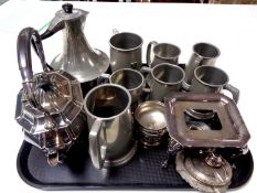 A tray of plated kettle with stand and burner,