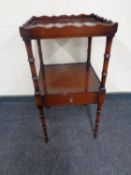 A Georgian style two tier washstand fitted a drawer by Glenister