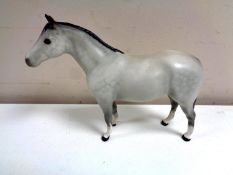 A Beswick Thoroughbred Stallion, small, in matte finish.