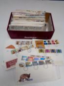 A box and two albums of first day covers