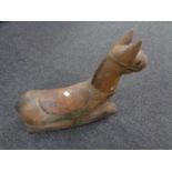 A carved miniature wooden rocking horse