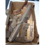 A box of vintage wood working planes