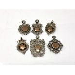 Six silver and gilt fobs CONDITION REPORT: 50.3g gross.
