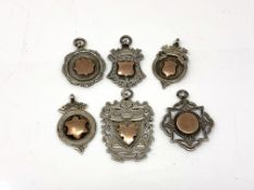 Six silver and gilt fobs CONDITION REPORT: 50.3g gross.