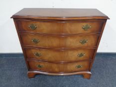 A Chapmans Siesta mahogany serpentine fronted four drawer chest