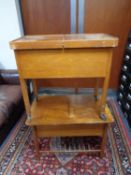 A mid 20th century sewing table and a sewing trolley