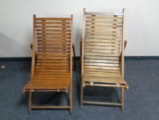 Two teak folding deck chairs