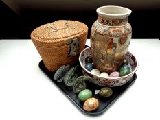 A tray containing hardstone eggs, carved animal ornaments, Japanese Satsuma baluster vase,