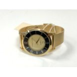 A Christin Lars gold plated wrist watch