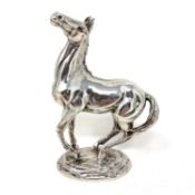 A limited edition cast silver model of a horse, 'Playing Up', by Lorne McKean, with certificate,