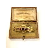 A late Victorian 9ct gold gem set brooch CONDITION REPORT: 4.