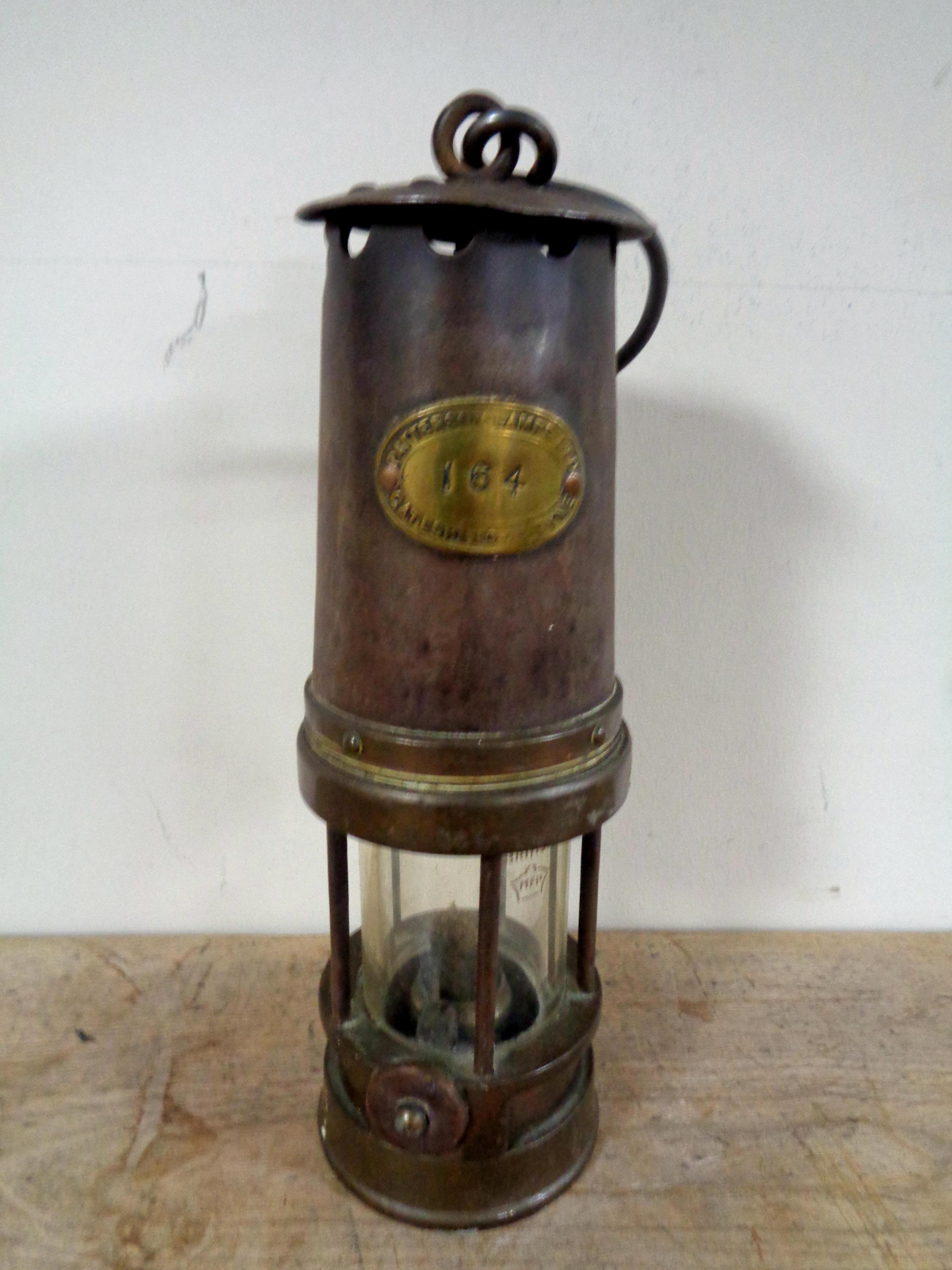 A Patterson miner's lamp numbered 164