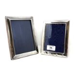 Two silver photograph frames, tallest 18 cm.