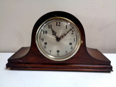 An oak cased 1930s Enfield mantel clock with silvered dial