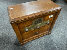 An early 20th century oak cased radio