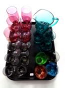 A tray containing 20th century coloured glassware