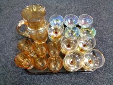 A tray containing a quantity of 20th century amber and opalescent glassware