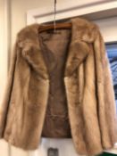 A lady's blonde mink fur jacket