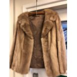 A lady's blonde mink fur jacket