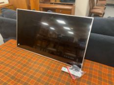 A Panasonic TX-L47FT60B 46 inch LCD TV with remote and lead
