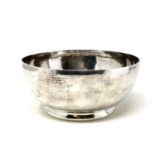 An Elizabeth II hammered silver bowl, Richard Comyns, London 1945,