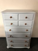 A contemporary painted pine chest of eight drawers