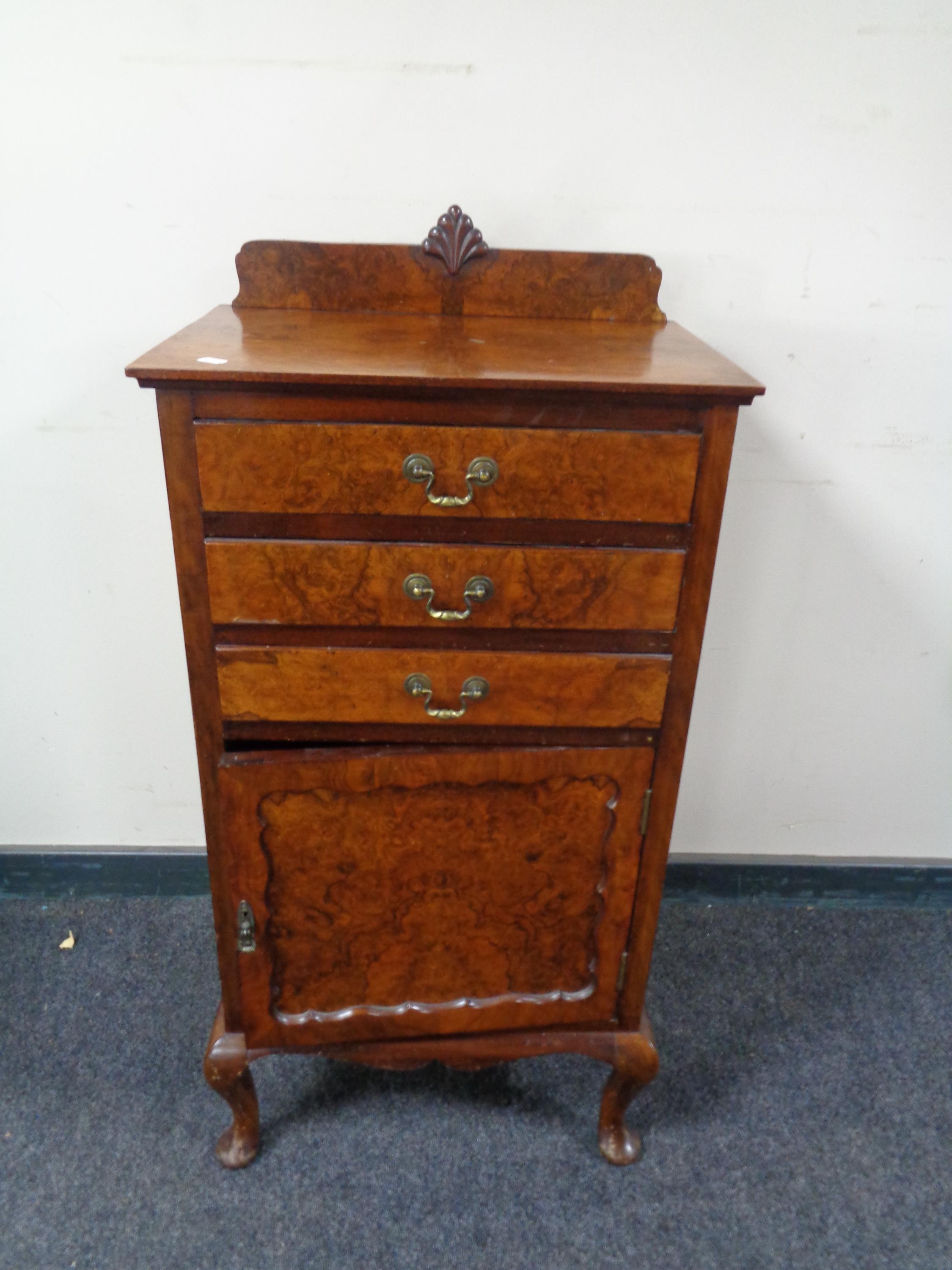 A burr walnut record cabinet