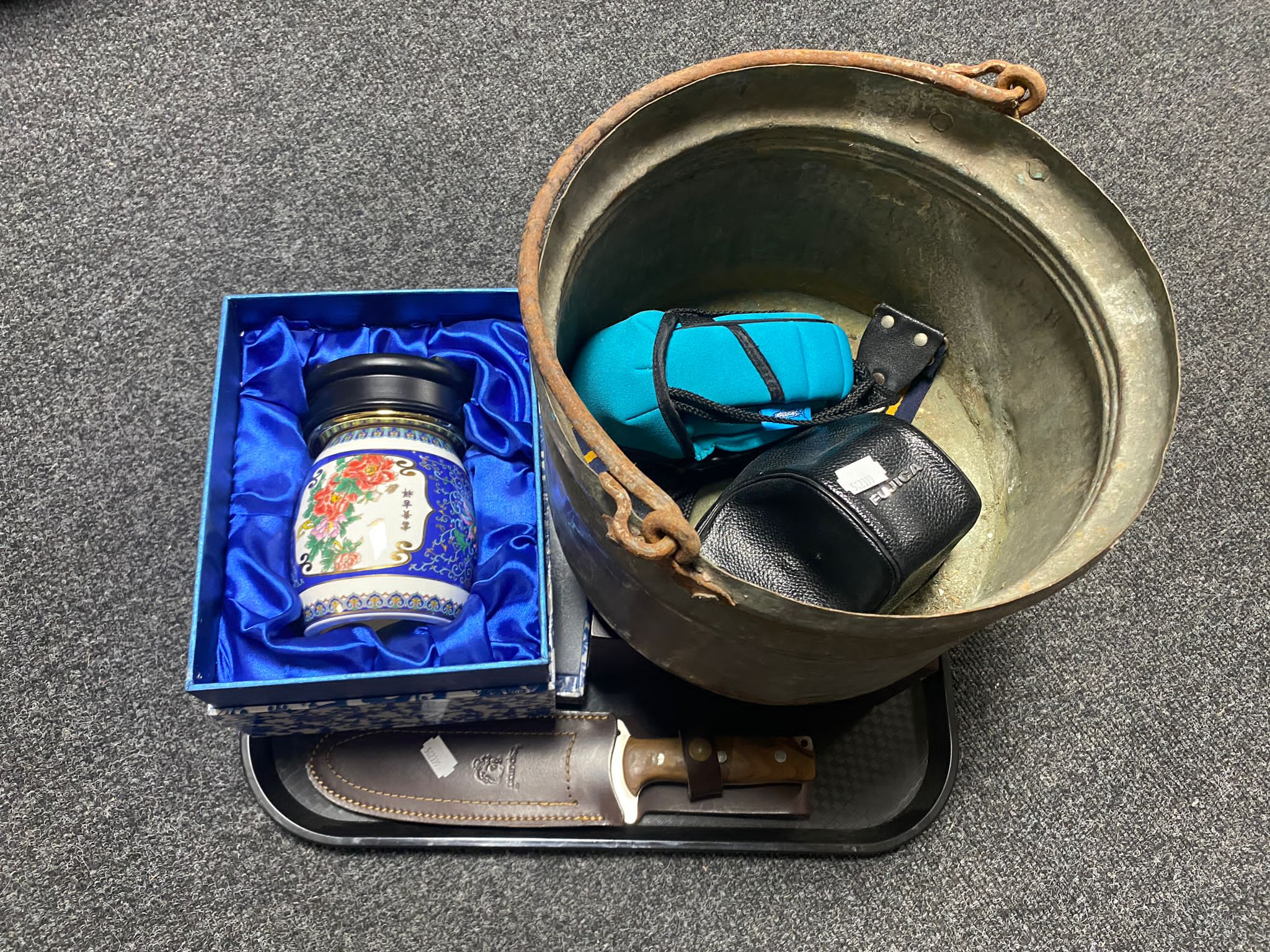 A tray containing swing handled metal cooking pot, bottle corking set, oriental style vase in box,