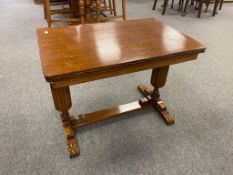 An oak refectory coffee table