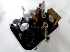 A tray containing four piece Picquot ware tea set, pair of Carl Zeiss binoculars, candelabrum,