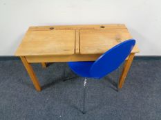 A child's pine double desk and chair