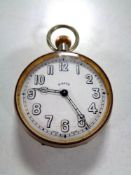 A large plated cased eight day pocket watch