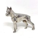 A cast silver model of a boxer dog, realistically modelled, height 5 cm.