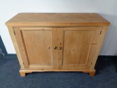 A Victorian pine double door cabinet