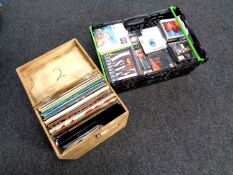 A crate containing a large quantity of CDs, DVDs and 45s, various,