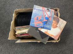 A box containing a large quantity of 45 singles,