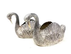 A finely modelled pair of silver swans, C J Vander Ltd, London 1978, length 22cm.