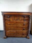 A Victorian mahogany scotch chest with barley twist supports,