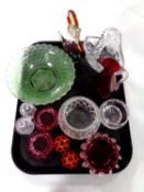 A tray containing 20th century coloured glassware, glass basket,