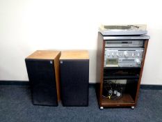 A teak cased Technics audio cabinet containing Hitachi direct drive turntable model HT-41S,