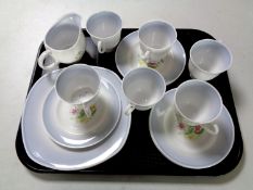 A tray containing 13 pieces of Susie Cooper bone tea china