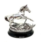 A limited edition cast silver model of a horse on plinth, 'Startled Yearling', by Geoffrey Snell,